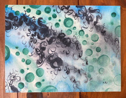 Abstract watercolor painting hanging on a wall with greens, blues and black depicting circular shapes and squiggly marks.